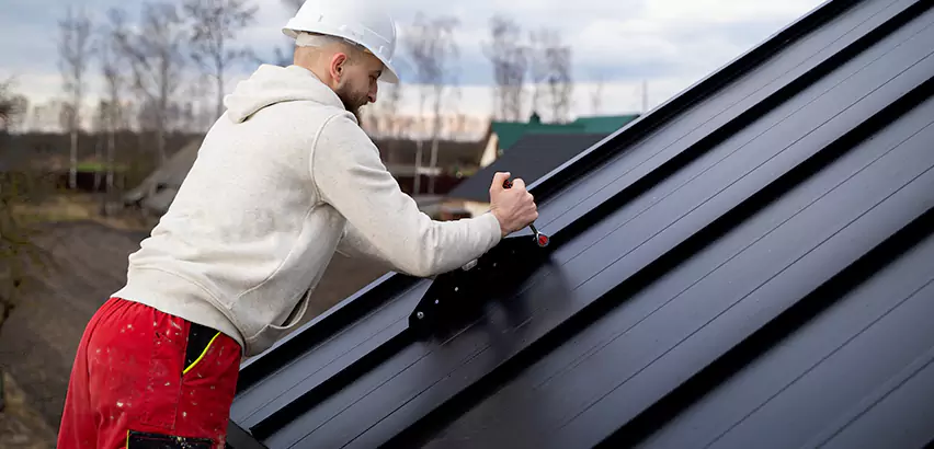 Tin Roof Ridge Cap Installation in Dundee